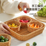 Snacks are placed in fruit bowls, afternoon tea in the home living room, snack trays, rattan weaving grids, fruit baskets, dried fruit plates